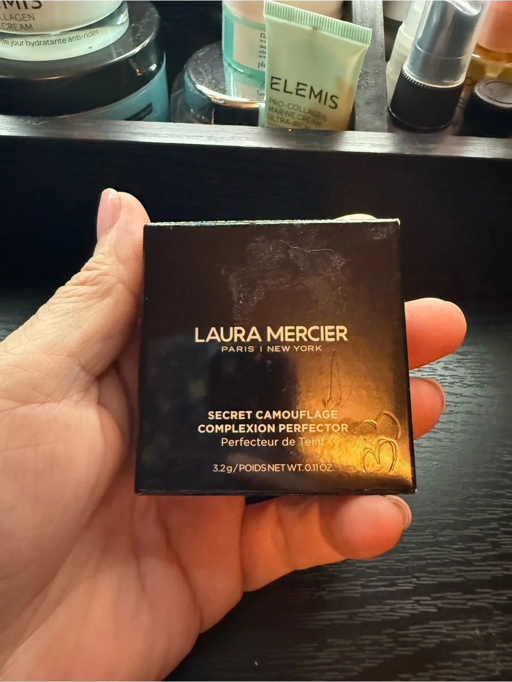 laura mercier glossy compact
